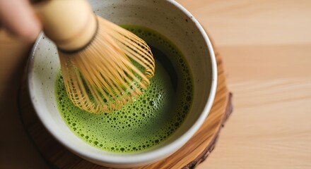 Zen-like Green Tea Ceremony: A serene matcha tea ceremony unfolds, capturing the delicate dance of whisking vibrant green tea with a bamboo whisk.