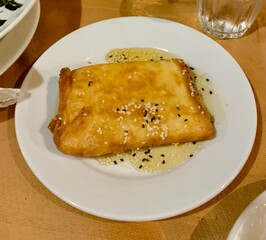 fried feta cheese on a plate
