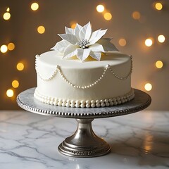 Elegant white cake with poinsettia decoration and bokeh