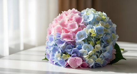 Heart-Shaped Hydrangea Bouquet on White Table in Soft Sunlight