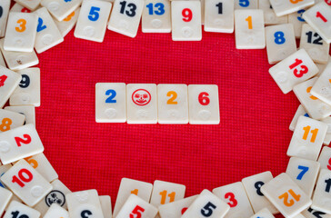 Rummikub Classic Board Game Tiles Forming a Playful New Year 2026 Message