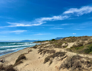 wonderful beach with dunes near Marbella, wooden walkway to the Mediterranean Sea, Cabopino, Costa del Sol in the summer, Andalusia, Spain