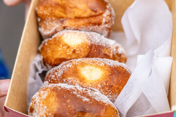A malasada is a Portugese doughnut without a hole. Leonard's Malasada Mobile. Food truck. Windward Mall, Kāne‘ohe, Honolulu, Oahu, Hawaii. Leonard's Bakery. Cuisine of Hawaii.

