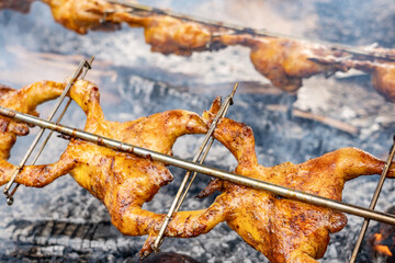 Yummy Huli Huli Chicken. Honolulu, Oahu, Hawaii. Huli-huli chicken is a grilled chicken dish in Hawaiian cuisine, prepared by barbecuing a chicken over mesquite wood.