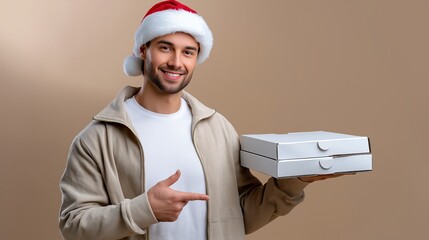 Christmas Pizza Delivery. Smiling man wearing Santa hat holding pizza boxes, showcasing festive food delivery service, perfect for Christmas celebrations.