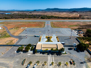 Airfield passenger terminal with parking in front in Guanambi Bahia Brazil