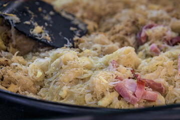 Choucroute garnie, sauerkraut with sausages, Christmas Market, Strasbourg France