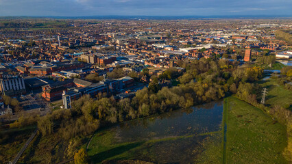 Aerial landscape showing city development and flooded fields
