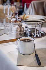 Winter wonderland, mug of mulled wine at a fondue restaurant, Zurich Switzerland