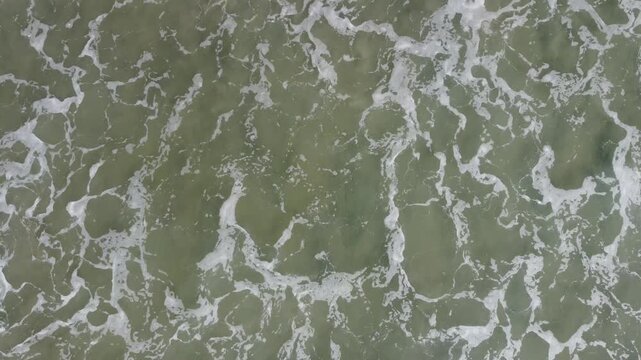 Aerial Drone View of Torrey Pines Coastline at Sunrise, Foggy Morning with Foamy Ocean Waves
