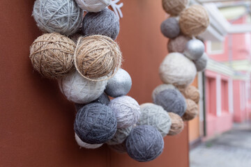 Minimal style Christmas door wreath on the front door of the house