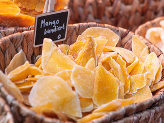 Dried Mango Slices in Rustic Baskets at Market