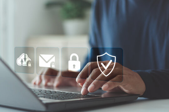 Cyber insurance, insurance that protect your business from cyber threats. Privacy data protection from hacker crime technology. Businessman using laptop with cyber security icon on virtual screen. - Powered by Adobe