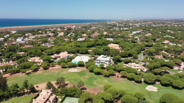 Vale de Lobo Luxurious seaside property overview, Breathtaking aerial view of coastal estate environment, Spectacular panoramic shot showcasing exclusive seaside neighborhood features