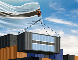 Botswana Flag and Shipping Container: Botswana's flag proudly displayed, a shipping container adorned with the nation's colors, symbolizing trade and global presence.