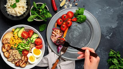 Person eating healthy buddha bowl for lunch, nutritious meal with grilled vegetable. Wholesome food preparation mindful response to challenges in market