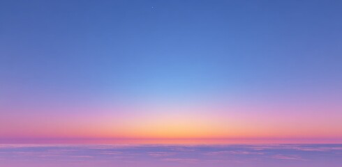Dreamy gradient sky background with soft transition from deep blue to warm orange and pink hues