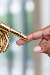 A close-up of a human fingertip gently touching a golden robotic finger, representing human–AI connection and future interaction