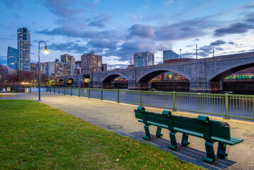 View of the iconic architecture of Boston in Massachusetts, USA at night showcasing the North End of the city with its mix of contemporary and historic buildings.