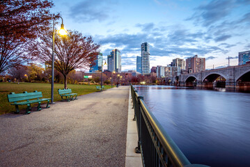 View of the iconic architecture of Boston in Massachusetts, USA at night showcasing the North End of the city with its mix of contemporary and historic buildings.