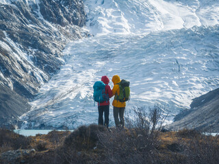 Fototapeta premium Backpacking hikers hiking on high altitude mountain top