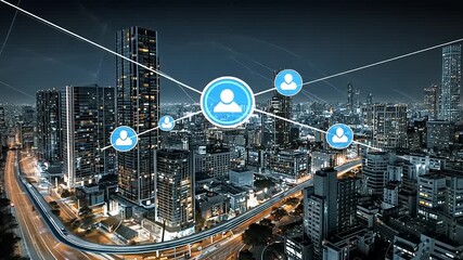 A vibrant cityscape at night showcasing urban connectivity with digital networking icons above buildings - Powered by Adobe