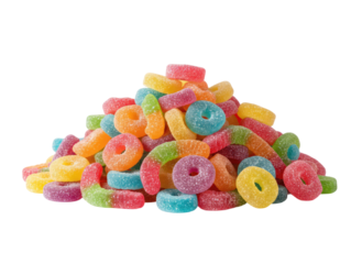 Pile of vibrant gummy rings and worms on transparent backdrop for snack
