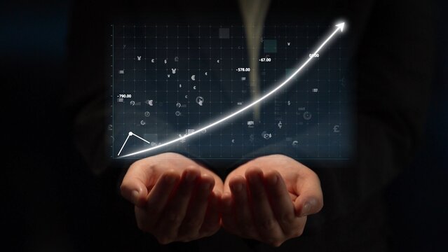 Hands support a rising graph with digital icons, representing business growth and success in today economy and technology-driven world. Copula