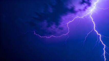 A dramatic lightning strike illuminates a dark stormy sky with vivid purple and blue hues.