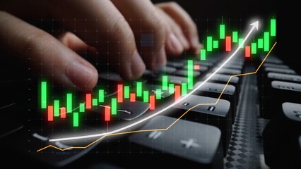 Hands typing on a keyboard are shown, overlaid with a colorful financial chart indicating a strong upward trend, representing investment and trading success. Copula