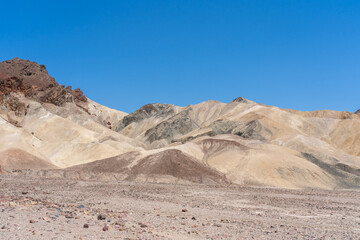 View of Zabriskie Point in Death Valley National Park in California, United States. Zabriskie Point is a part of the Amargosa Range located east of Death Valley noted for its erosional landscape.  © JHVEPhoto