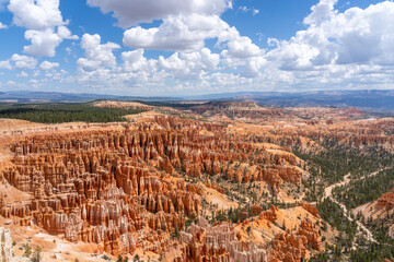 View of Bryce Canyon National Park in southern Utah, USA. 
Bryce Canyon National Park is known for crimson-colored hoodoos, which are spire-shaped rock formations. 