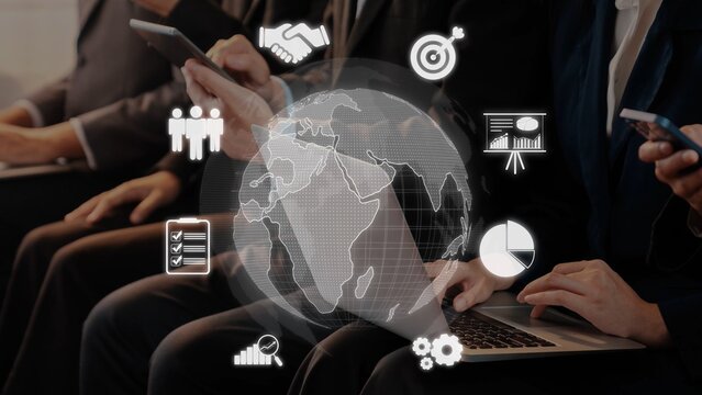 A diverse group of business professionals engaged in digital activities, surrounded by icons symbolizing global connectivity and collaboration in today corporate environment. Raster