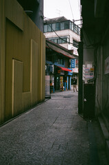 Narrow Alley Leading to Shopping Street in Myeongdong, Seoul