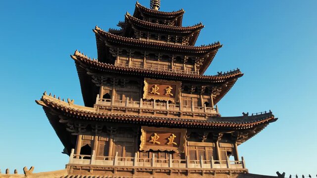Majestic Chinese Pagoda: Ancient Architecture in Golden Sunlight