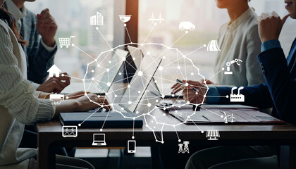 会議するビジネスパーソンのグループとAI・人工知能のコンセプト