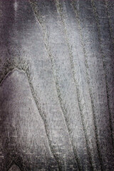 wooden background, board gray surface, natural wood pattern, ash tree, vignetting, frame with a place for text or object, vertical, close-up