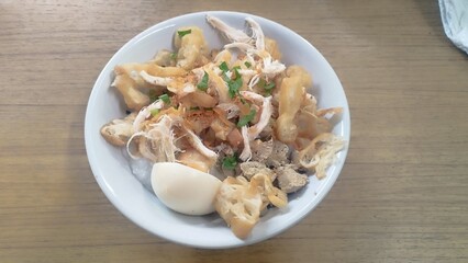 chicken porridge the traditional streetfood in Indonesia