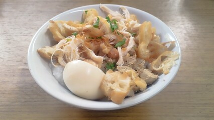 chicken porridge the traditional streetfood in Indonesia