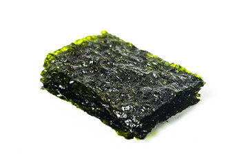 Piles or stack of nori dried seaweed isolated on white background. Clipping path. Asian food. Healthy Snack. sheets. close up view. © Muhammad