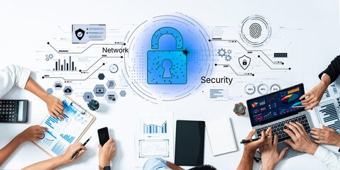 A modern digital workspace featuring teamwork on network security, showcasing a digital lock, data analysis tools, and elegant business graphics. Trope