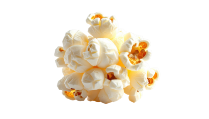 Isolated clump of popcorn against black backdrop, showing popped kernels with some orange hues highlighting textures
