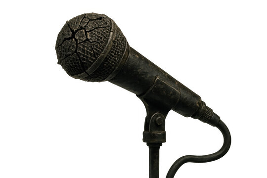Vintage microphone on stand with cracked mesh, a retro audio equipment for music, broadcast, and performance themes