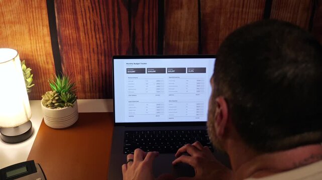 Self Employed Businessman Doing His Monthly Budget with 6-7 Twist - Business Budgeting 6 7 Numerology Concept