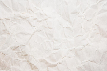 Crumpled White recycled craft paper texture as background.