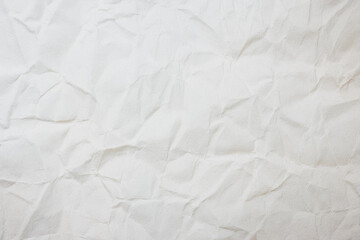 Crumpled White recycled craft paper texture as background.
