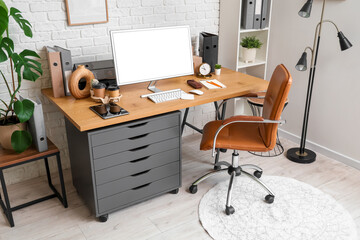 Comfortable workplace with modern computer in office