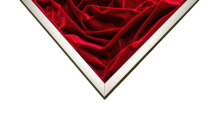 Triangle frame filled with draped, richly red velvet, viewed against a dark black background