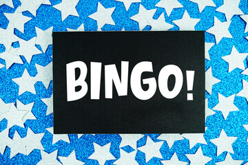 Bingo! Card on Blue Glitter Star Background