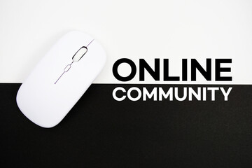 Online Community text and wireless mouse on white and black background